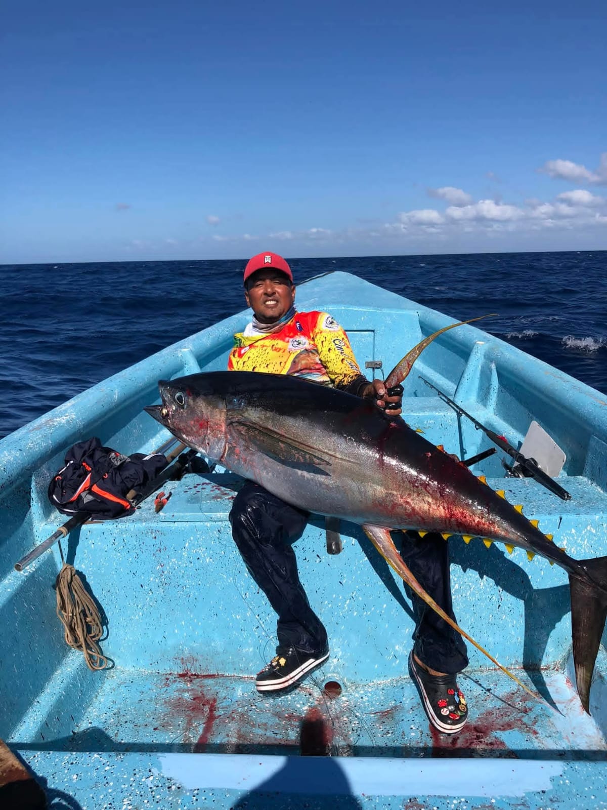 Fisherman holding large catch